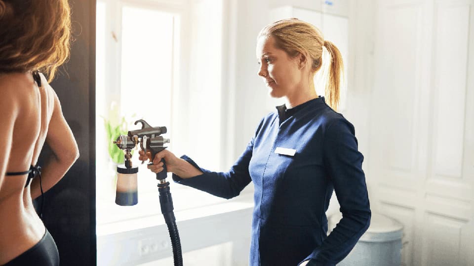 beauty side hustles spray tan technician
